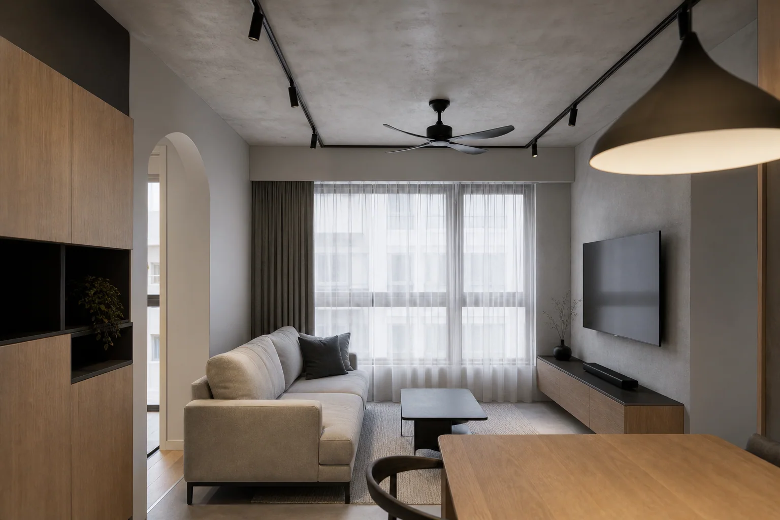 Compact living room render showing a restrained first design pass with timber storage and HDB-scale proportions